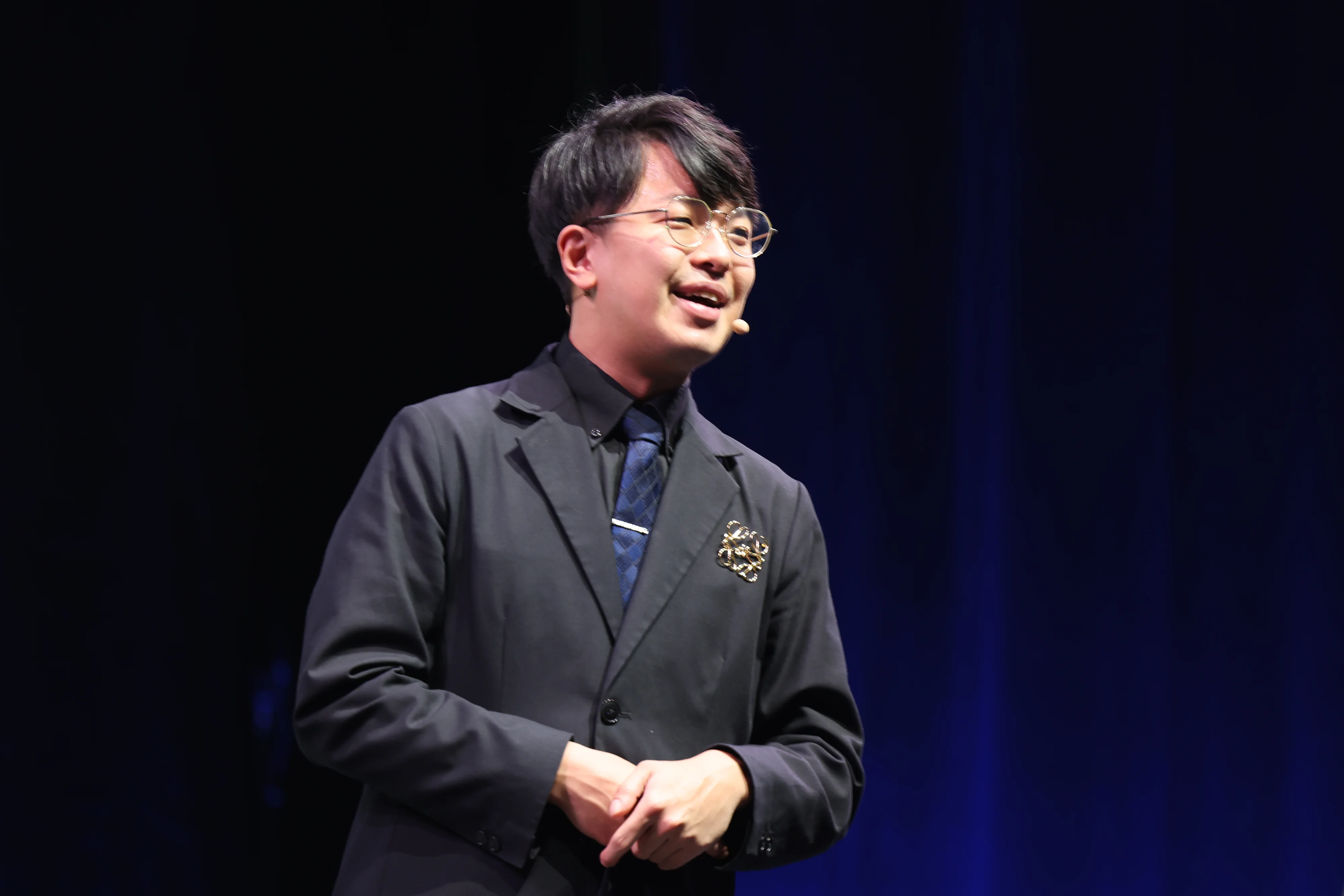 登壇する小澤健祐