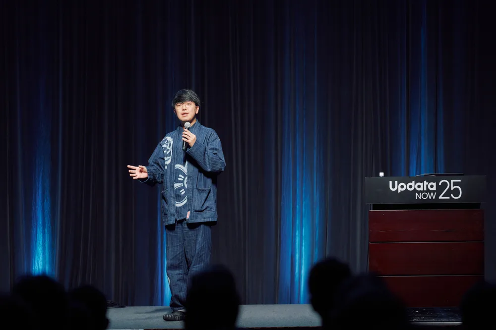 基調講演で登壇する小澤健祐